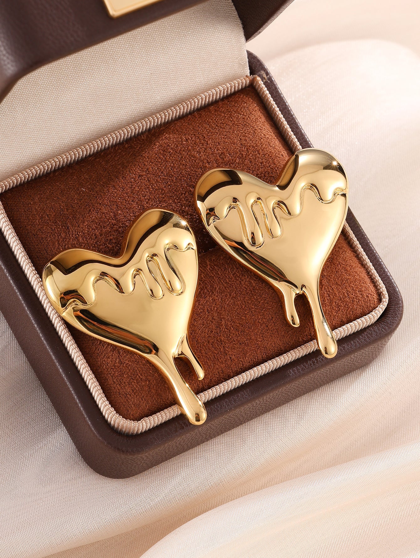 Melted Heart Statement Earrings