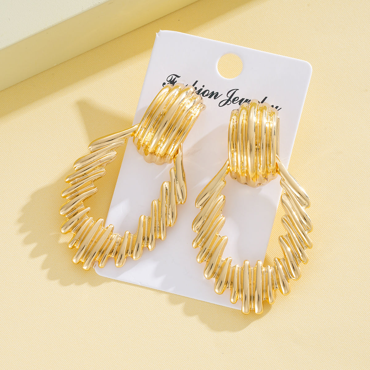 Textured Gold Teardrop Statement Earrings