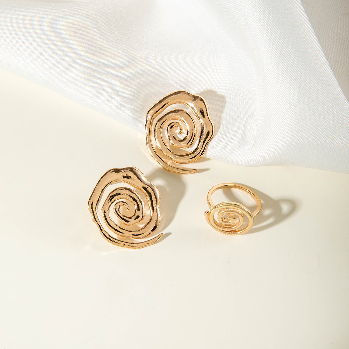 Gold Spiral Stud Earrings & Ring Stack