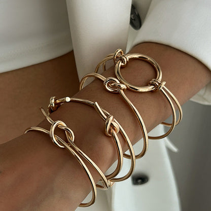 Multilayer Silver Hollow Knot Bangle Stack