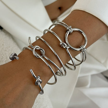 Multilayer Silver Hollow Knot Bangle Stack