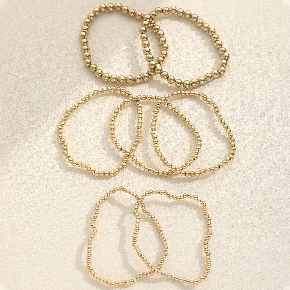 Beaded Gold Charm Elastic Bracelet