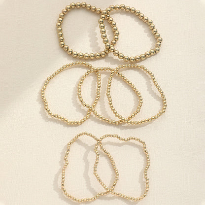 Beaded Gold Charm Elastic Bracelet