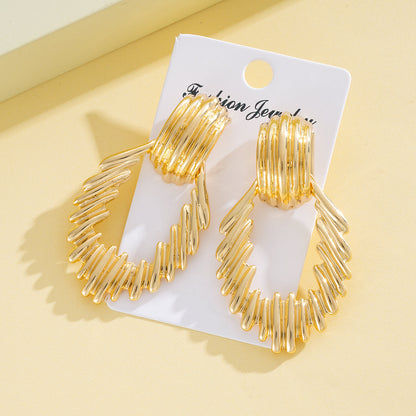 Textured Gold Teardrop Statement Earrings