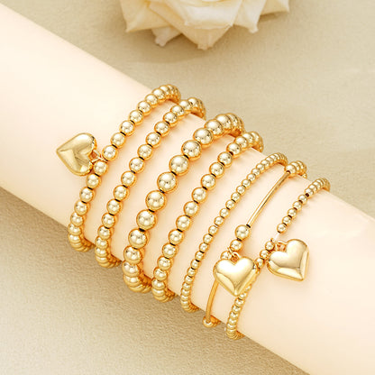 7pc Gold Beaded Heart Charm Bracelet Set