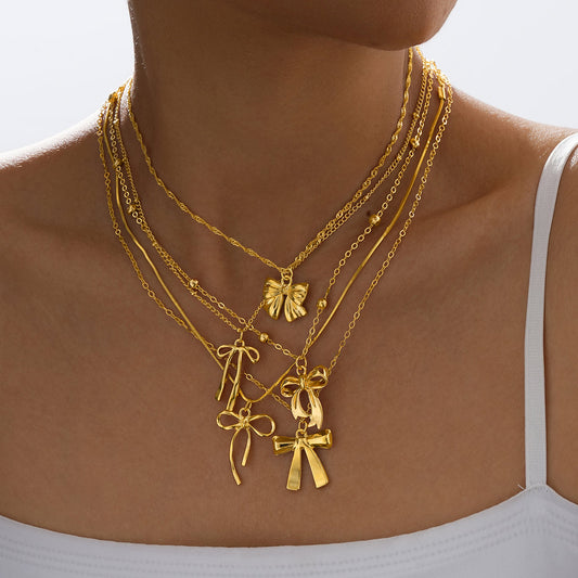 5pc Layered Bow Charm Necklace Set