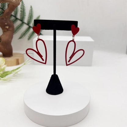 Hollow Love Heart Tassel Earrings