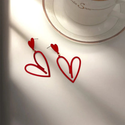 Hollow Love Heart Tassel Earrings